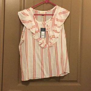Thin cotton top. Very soft. Never been worn.